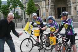 On you go lads! Actor Tim McGarry gives the cyclists some encouragement outside St Anne's on day one.